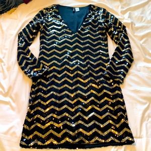 Black and gold sequin dress